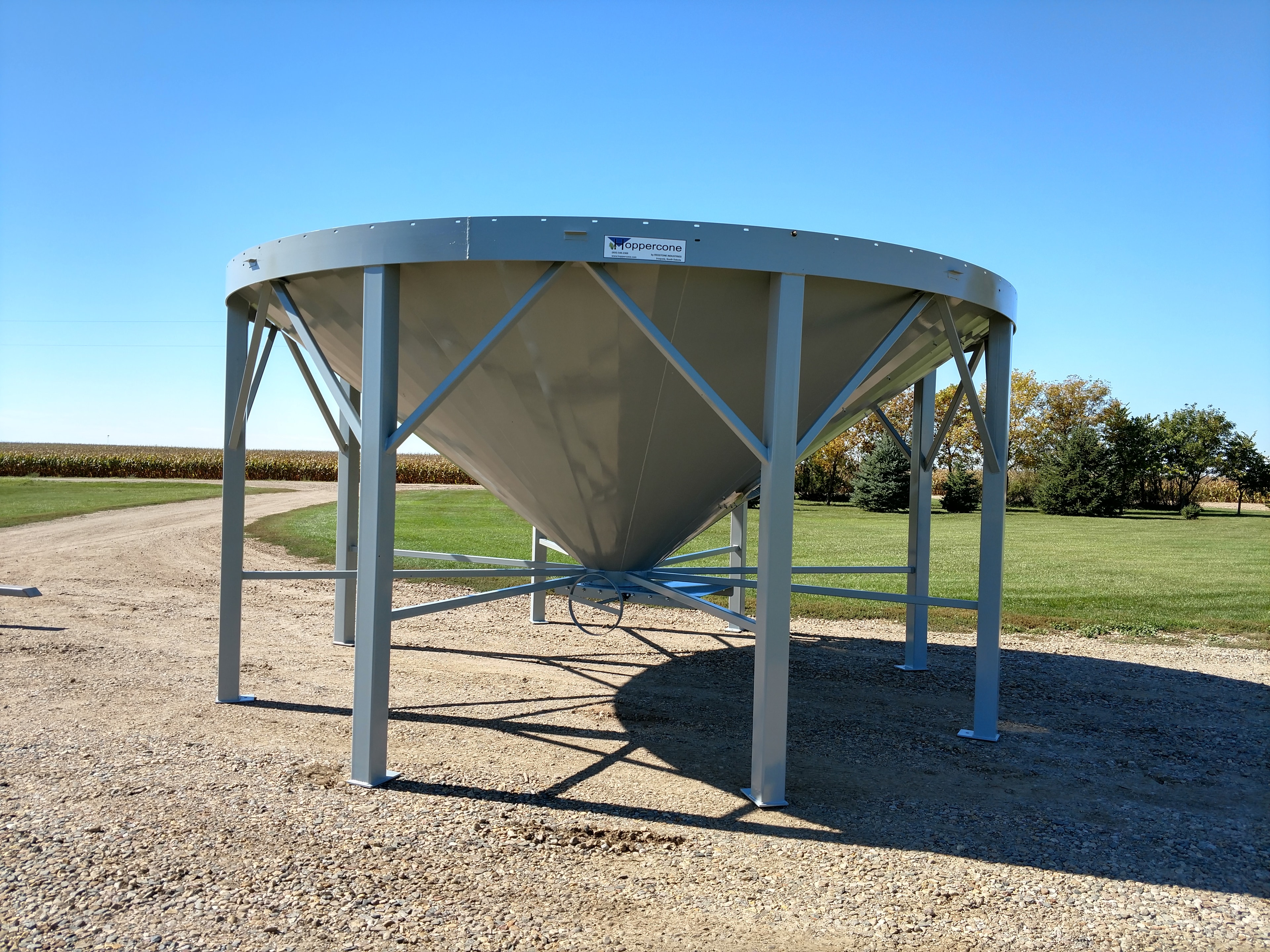 18 foot HopperCone standing in field
